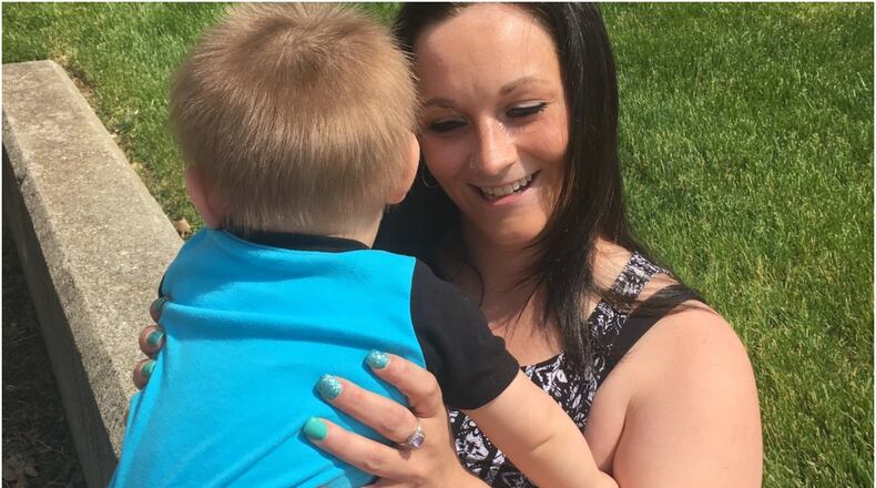 Megan Franken, 26, of Hamilton, has been addicted to heroin for the past seven years. She was granted legal custody of her 13-month-old son this week. The single mother, who twice has lost custody of her son due to her drug addiction, said she’s done with heroin now and forever. RICK McCRABB/STAFF