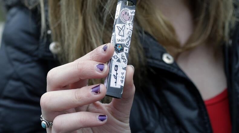 E-cigarette cartridges such as this one can easily be concealed because they are less than 4 inches long and resemble a flash drive. ASSOCIATED PRESS