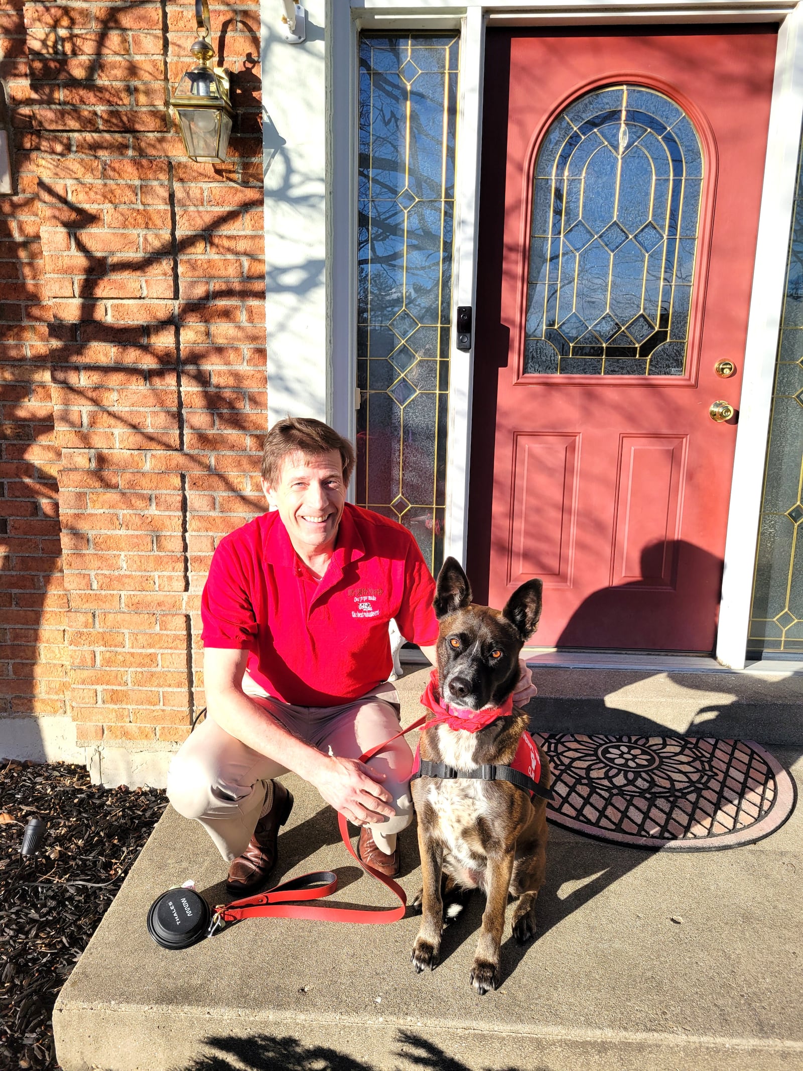 Dave Corman and his therapy dog Clara.  Once a week they go to Drake Hospital in Cincinnati, where they visit patients, especially long-term patients who are stroke victims or have traumatic brain injuries. This photo is from May of 2024 before Dave and Clara made their 150th visit to Drake. CONTRIBUTED PHOTO