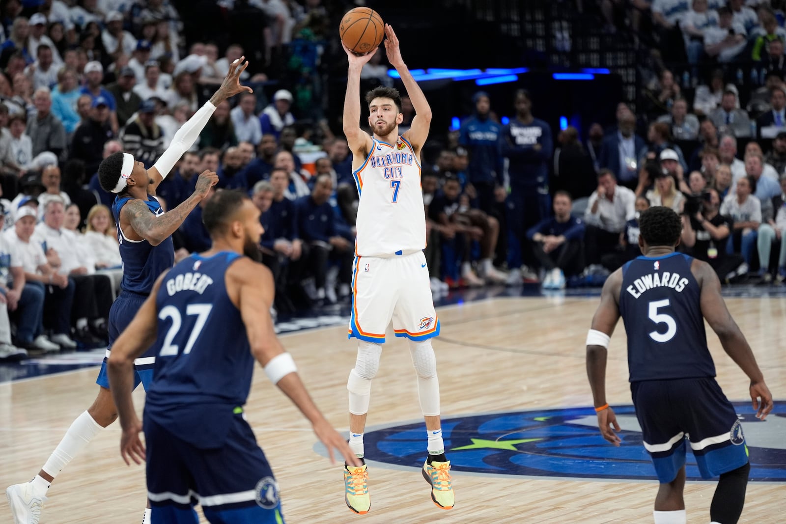 Oklahoma City Thunder forward Chet Holmgren (7) shoots against against the Minnesota Timberwolves during the second half of Game 4 of the Western Conference finals of the NBA basketball playoffs Monday, May 26, 2025, in Minneapolis. (AP Photo/Abbie Parr)