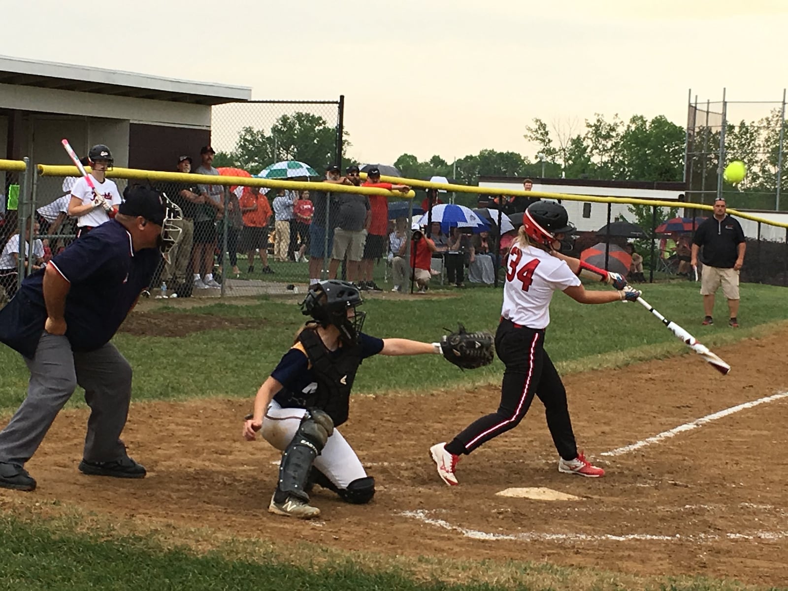 Franklin’s Chloe Miller (34) makes contact with the ball during a May 16 Division II district semifinal against Monroe at Lebanon. RICK CASSANO/STAFF
