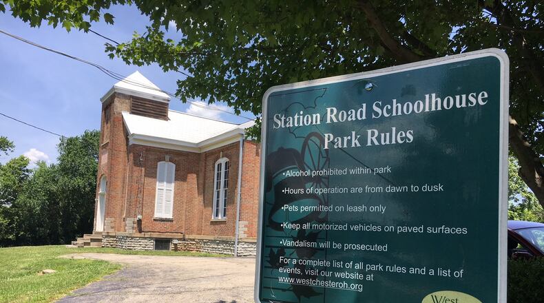 The historic Station Road schoolhouse in West Chester Twp. continues to be at the center of a battle between the owners of the Community Montessori School and neighbors who don’t want them to be able to buy the building from the township.