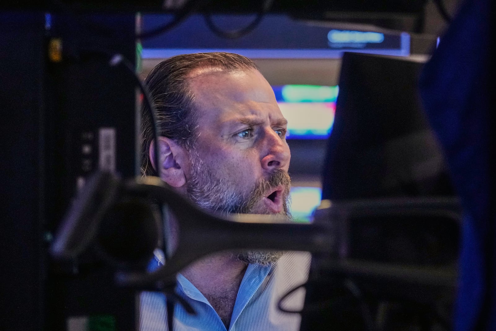 Specialist Michael Pistillo works at his post on the floor of the New York Stock Exchange, Monday, June 23, 2025. (AP Photo/Richard Drew)