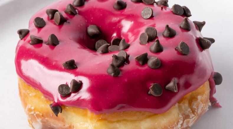 Graeter’s Ice Cream is celebrating the relaunch Braxton Brewing Co.’s Black Raspberry Chocolate Chip Milk Stout by releasing its own variation on its popular ice cream flavor: a Black Raspberry Chocolate Chip donut. CONTRIBUTED