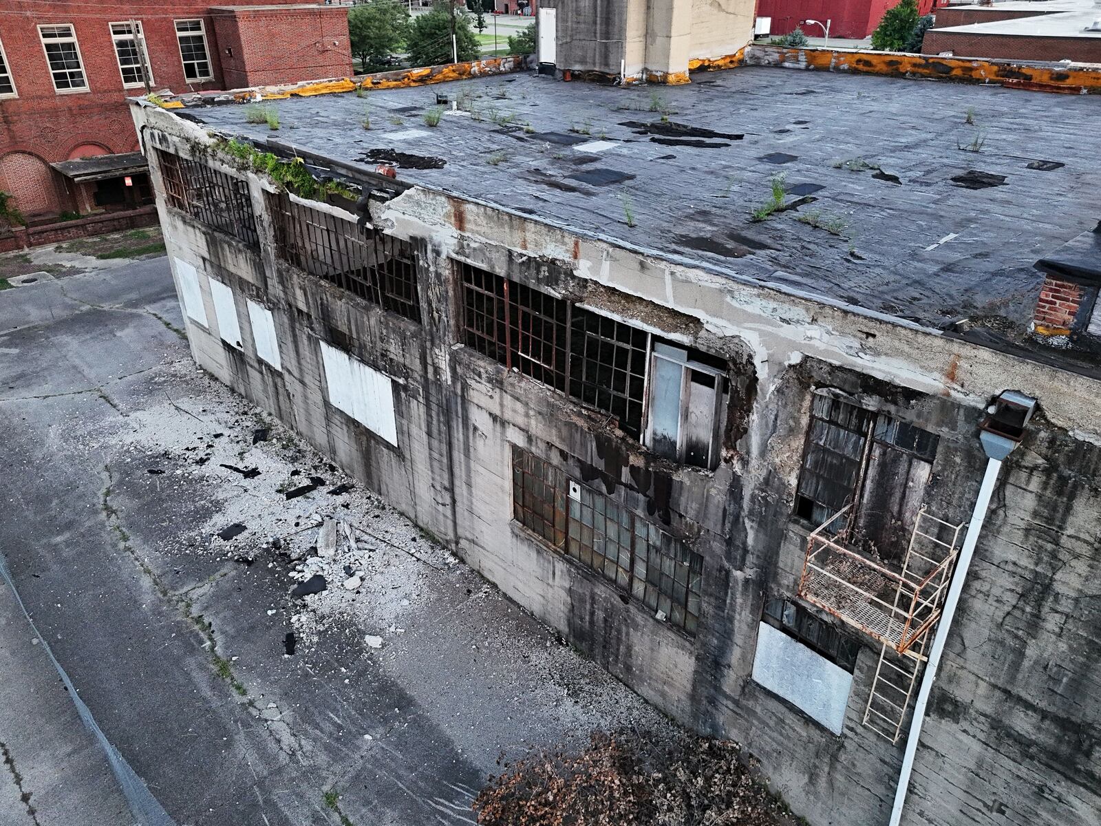 Middletown is asking residents for their opinion on the fate of two downtown buildings, the Manchester Inn and the Sonshine building. NICK GRAHAM/STAFF