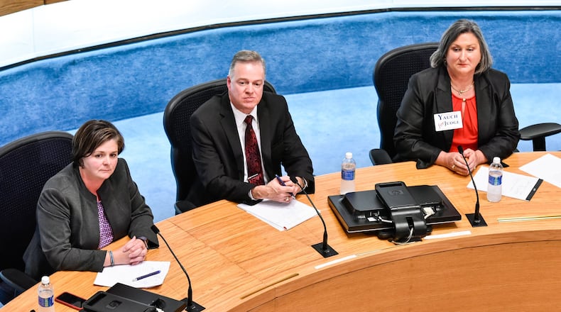 Melynda Cook Howard, left, James Sherron, middle, and Elizabeth Yauch participated in a forum for Middletown Municipal Judge candidates Tuesday, Oct. 24, in city council chambers in Middletown. NICK GRAHAM/STAFF
