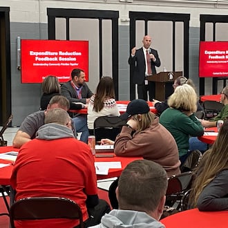 The Fairfield Board of Education will soon decide on a sweeping package of proposed budget cuts for next school year should voters reject an earned income tax in the May election. Last week, the school board agreed to consider a list of recommended reductions impacting teaching and administrative jobs, classroom instruction specialists, student programs, school building weekday and weekend hours, higher student sports and extracurricular fees, elimination of student field trips and more in the 10,000-student school system. Pictured is Fairfield Schools Treasurer Jay Phillips at a recent public forum on budget cuts. MICHAEL D. CLARK/CONTRIBUTED