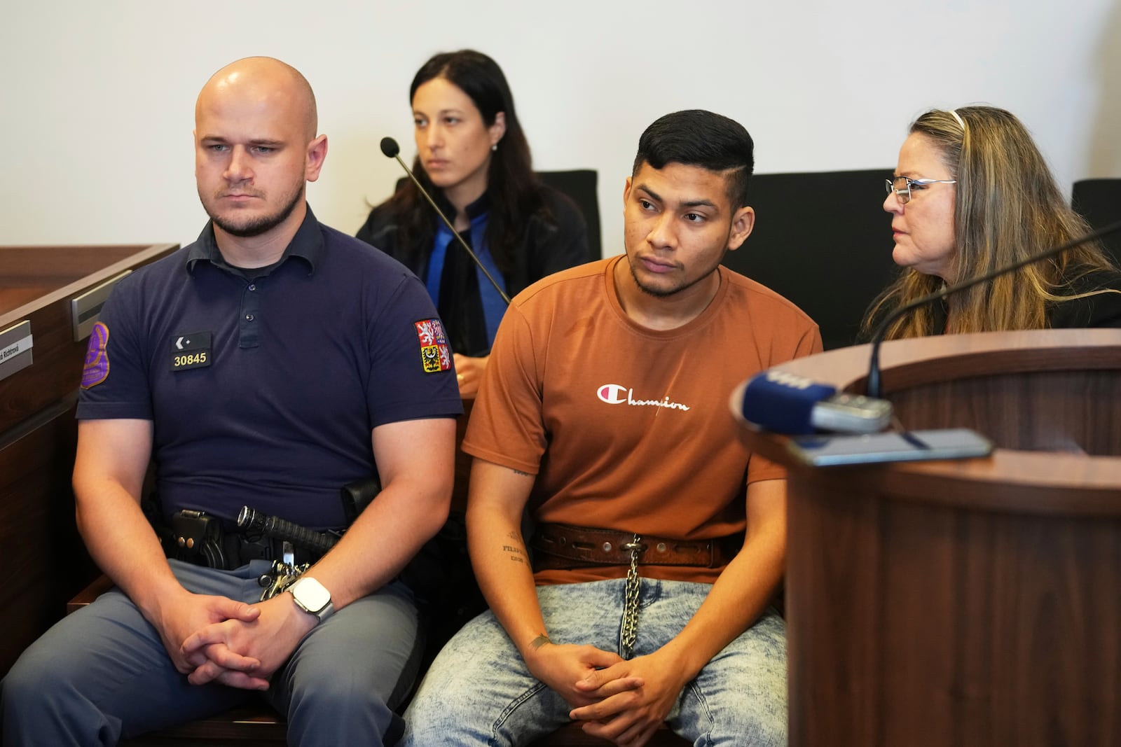 Columbian national Andres Alfons de la Hoz de la Cruz, front center, listens to ruling, that sends him to spend eight years in prison for a terrorist attack and planning another one, at a court in Prague, Czech Republic, Monday, June 9, 2025. (AP Photo/Petr David Josek)