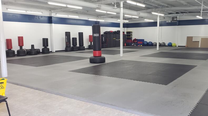 A martial arts business whose athletes routinely earn national titles recently moved into Middletown. The approximately 5,000-square-foot training facility at 1725 Yankee Road was a structure that had been vacant for more than a year before Rob and Melissa Gerhardt renovated it into the second home of Budokai Academy of Martial Arts. CONTRIBUTED