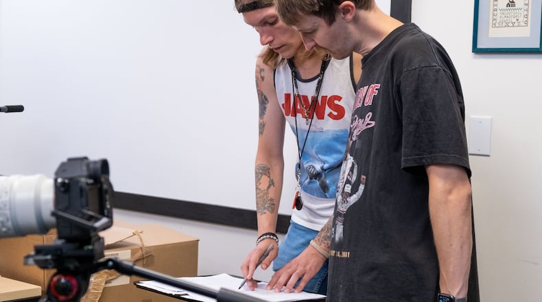 Two Hamilton High School graduates, Zach Pike (right) and Brad Huffman (left) have collaborated on "CHOKE," a feature-length film that will premiere at the Fitton Center on Sept. 7.