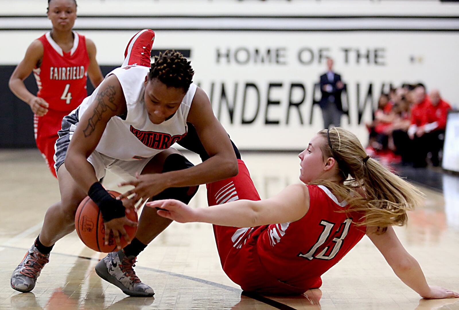 Withrow forward Doneasha Brewer battles Fairfield forward Addie Kidd for a rebound during their Division I sectional game at Lakota East on Saturday afternoon. CONTRIBUTED PHOTO BY E.L. HUBBARD