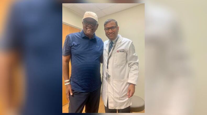The Rev. Michael Bailey, pastor of Faith United Church in Middletown, and his urologist, Dr. Nilesh Patil, were all smiles after Bailey was declared cancer free. CONTRIBUTED