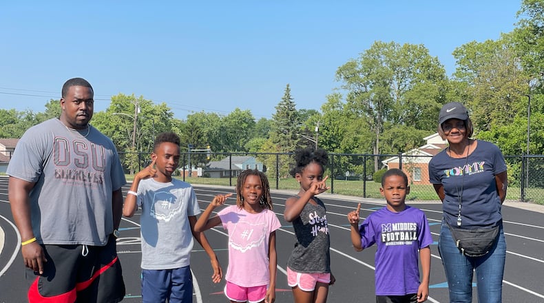 Four members of the Middletown Youth Track Club have qualified for the AAU National Junior Olympics in Texas. From left: Coach: Michael Dorn, Kee'J Edwards, Selah Edwards, Laila Dorn, Kamden Hunter and Coach Gina Powers. SUBMITTED PHOTO