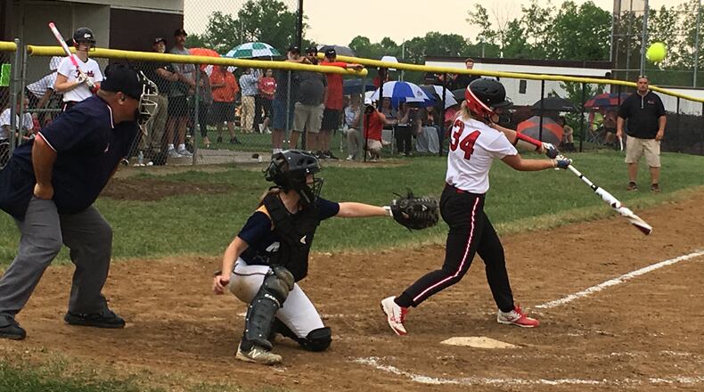 Franklin’s Chloe Miller (34) makes contact with the ball during a Division II district semifinal May 16, 2018, against Monroe at Lebanon. Monroe won 5-0. RICK CASSANO/STAFF