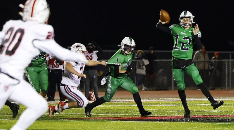 Badin quarterback Alex Ritzie theiws the ball during a 20-17 loss to Tippecanoe in their Division III Regional Final football game Friday, Nov. 18, 2022 at Trotwood-Madison High School. NICK GRAHAM/STAFF