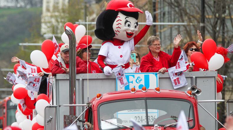 Rosie Red waves to the crowd, on Opening Day for the Cincinnati Reds, Monday, Apr. 3, 2017. GREG LYNCH / STAFF