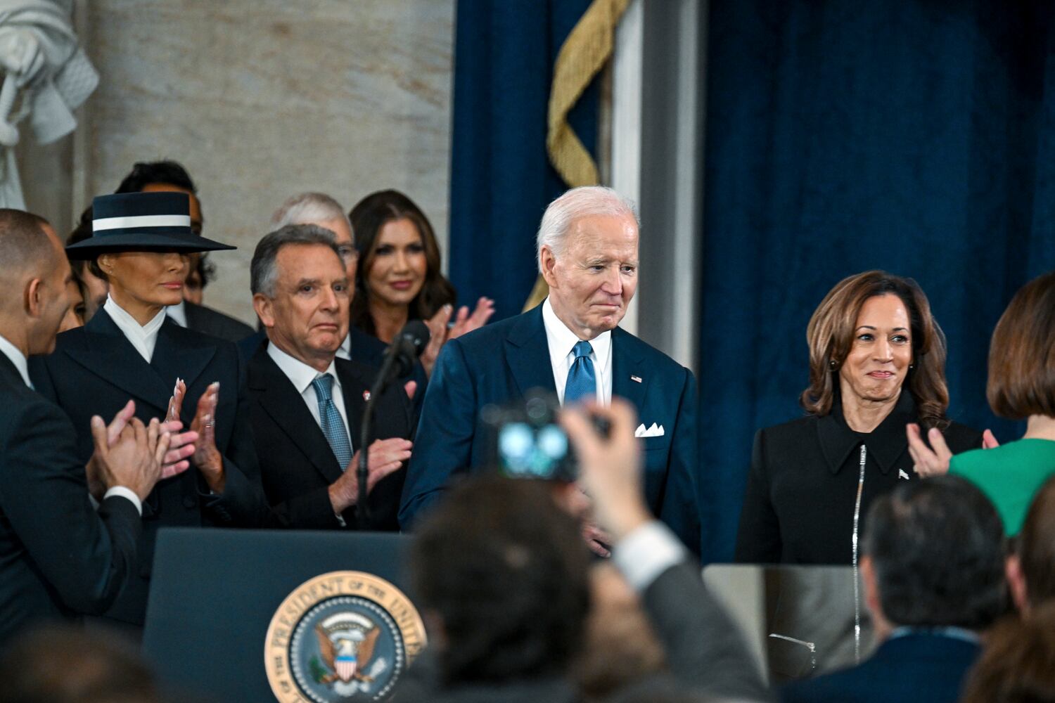 President Joe Biden and Vice President Kamala Harris arrive before the inauguration of Donald Trump as the 47th president in the Rotunda at the Capitol in Washington on Monday morning, Jan. 20, 2025. (Kenny Holston/The New York Times)