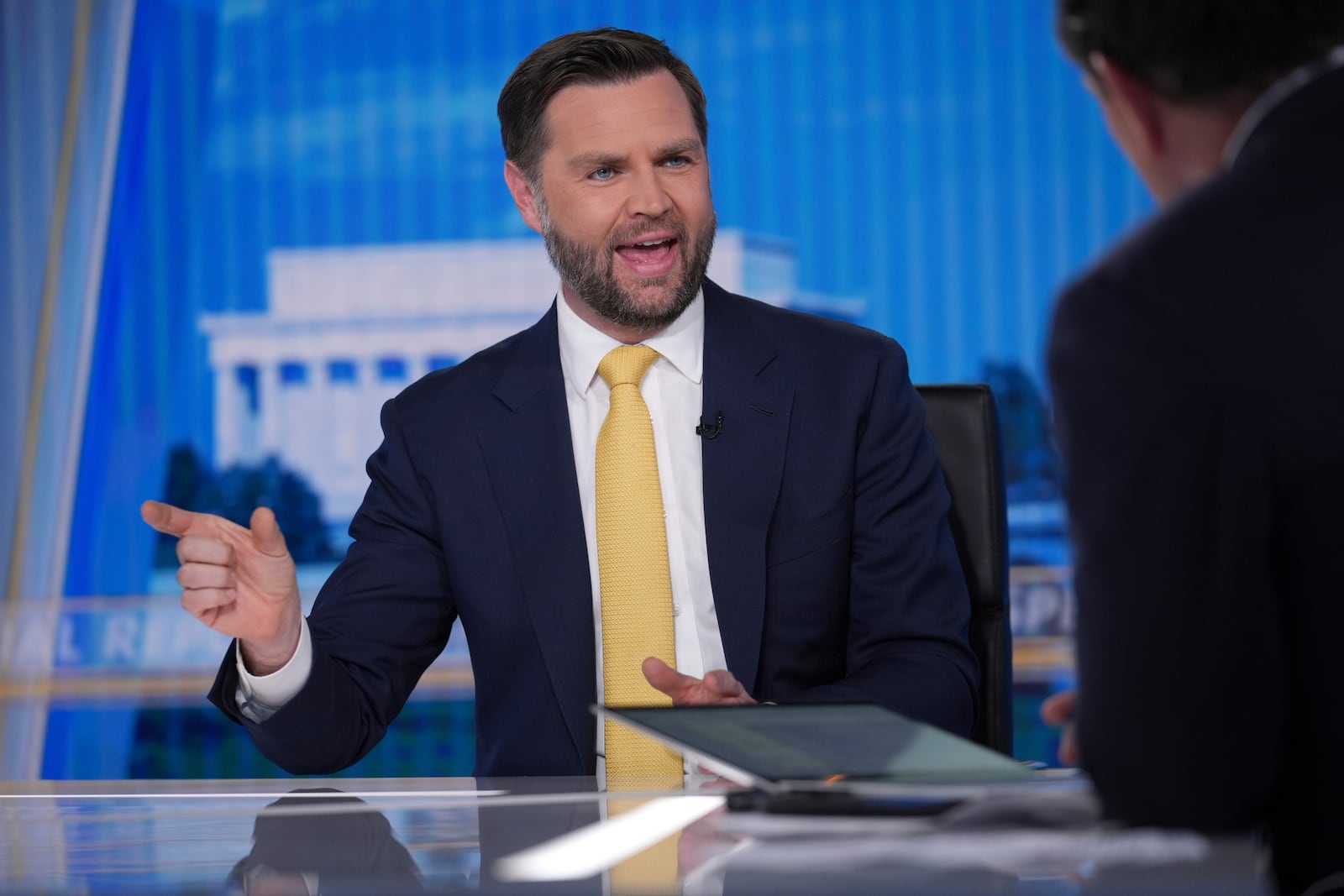 Vice President JD Vance speaks with Bret Baier, right, on FOX News Channel’s Special Report with Bret Baier at the FOX News bureau in Washington, Monday, June 23, 2025.(AP Photo/J. Scott Applewhite)