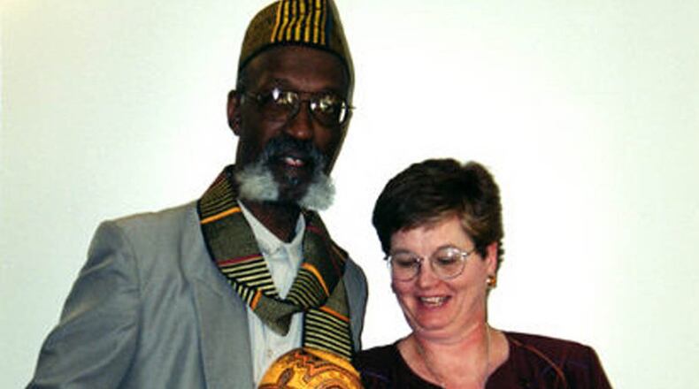 Willis “Bing” Davis and Tess Little, both local artists and educators and longtime friends, have lead the annual REACH Across Dayton conference for all its 25 years. Here they are at the session in 2001. CONTRIBUTED PHOTO