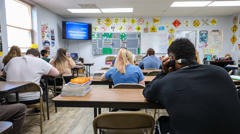 Students prepare for a class at D&D Driving School in Kettering on Wednesday, Aug. 6. A forthcoming change to Ohio law that will force more drivers in training to get a formal education is expected to bring more business to driver schools. BRYANT BILLING / STAFF