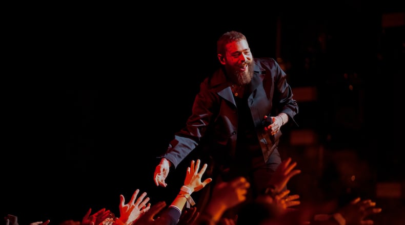 Post Malone performs before the NBA basketball All-Star game Sunday, Feb. 19, 2023, in Salt Lake City. (AP Photo/Rick Bowmer)