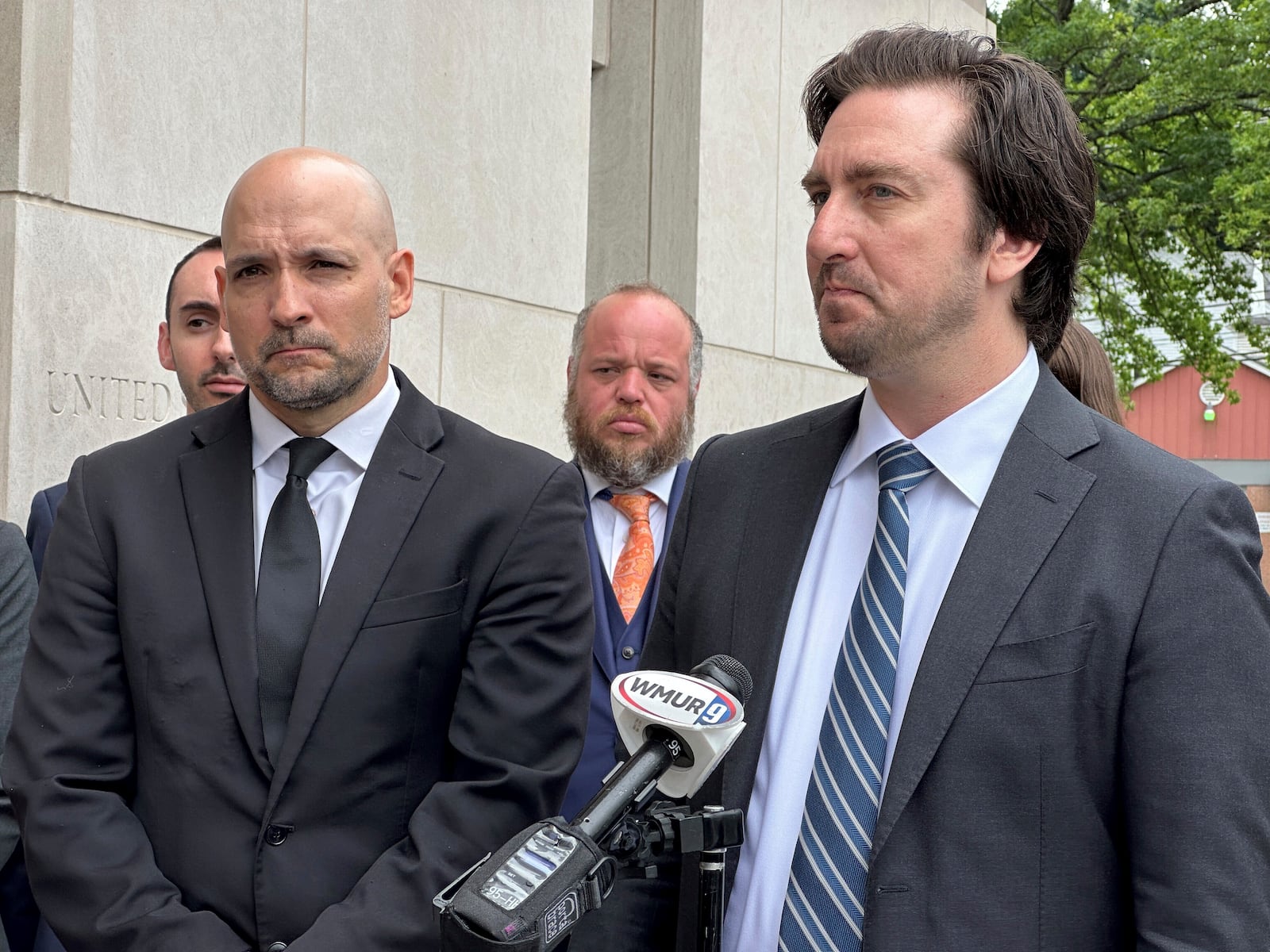 ACLU attorneys Gilles Bissonnette, left, and Cody Wofsy speak with reporters after a federal judge said he would certify their class action lawsuit challenging President Donald Trump's executive order ending birthright citizenship and issue a temporary injunction blocking the order for all children who would be affected by it on Thursday, July 10, 2025 in Concord, N.H. (AP Photo/Holly Ramer)