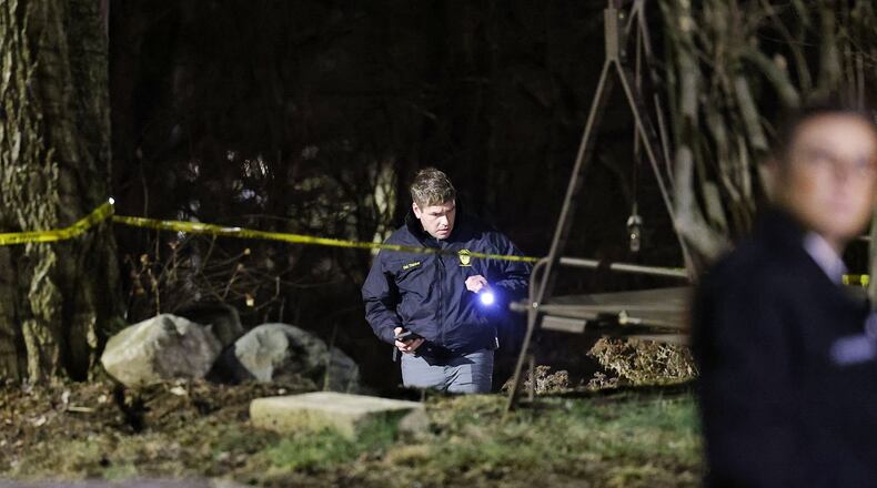 Police investigate a shooting on Summer Street in Hamilton Feb. 21, 2022. NICK GRAHAM / STAFF