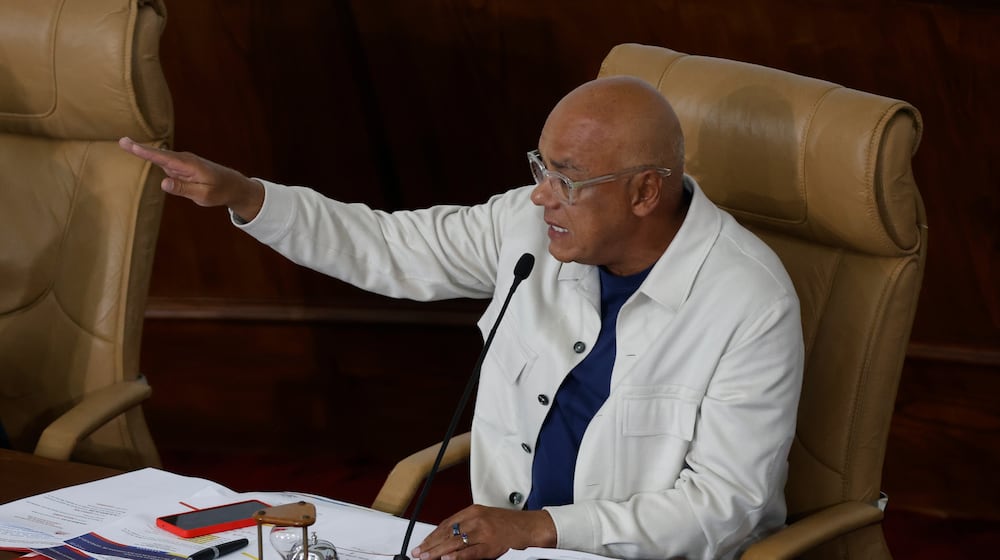 National Assembly President Jorge Rodriguez gestures during a debate on a mining bill at the National Assembly in Caracas, Venezuela, Monday, March 9, 2026. (AP Photo/Pedro Mattey)