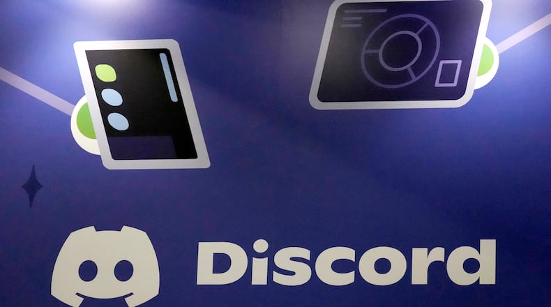FILE - A Discord display stands at the company's booth at the Game Developers Conference 2023, in San Francisco, March 22, 2023. (AP Photo/Jeff Chiu, File)