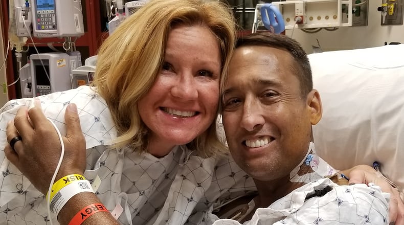 Ross Twp. Police Chief Darryl Haussler and his kidney donor Maria Wessel after the kidney transplant surgery on Monday at the University of Cincinnati Medical Center.