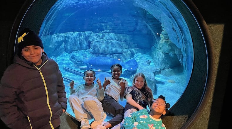 Some Rosa Park Elementary students recently got to spend a night sleeping with manatees at the Cincinnati Zoo. The unusual overnight field trip, which saw youngsters sleeping inside a special, wide-window viewing room next to the manatees’ aquarium tank is part of a school leadership program designed to enhance the learning of youngsters at the Middletown school. CONTRIBUTED