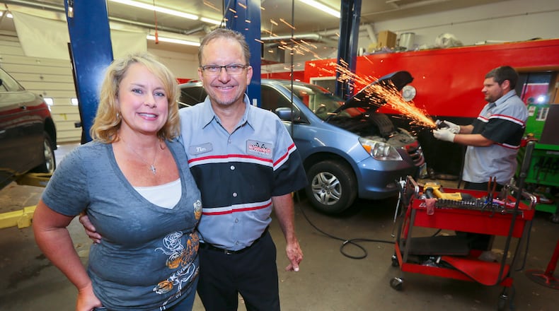 Tim and Marthan Ellison own and operate West Chester Twp. business Mr. Godwrench Automotive Service. The couple provides car repair and oil changes to the poor and needy and spiritual lessons aimed at “turning your automotive problems into blessings.” The place opened in 2009 and has steadily grown from one to four to six bays for car repairs. GREG LYNCH / STAFF