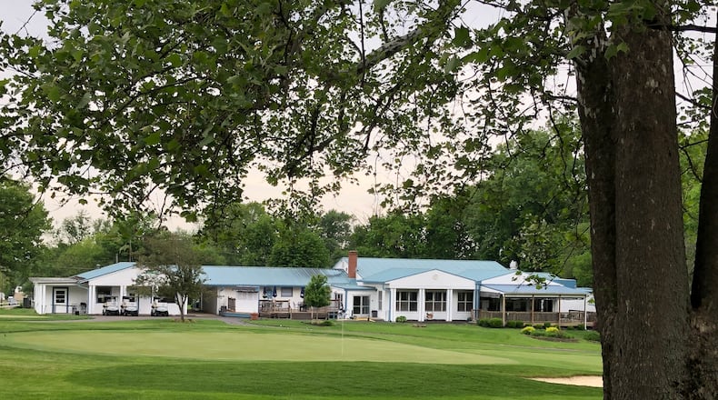 Wildwood Golf Club in Middletown has remodeled its clubhouse and pro shop and upgraded its sand traps and cart paths to attract new members. RICK McCRABB/STAFF