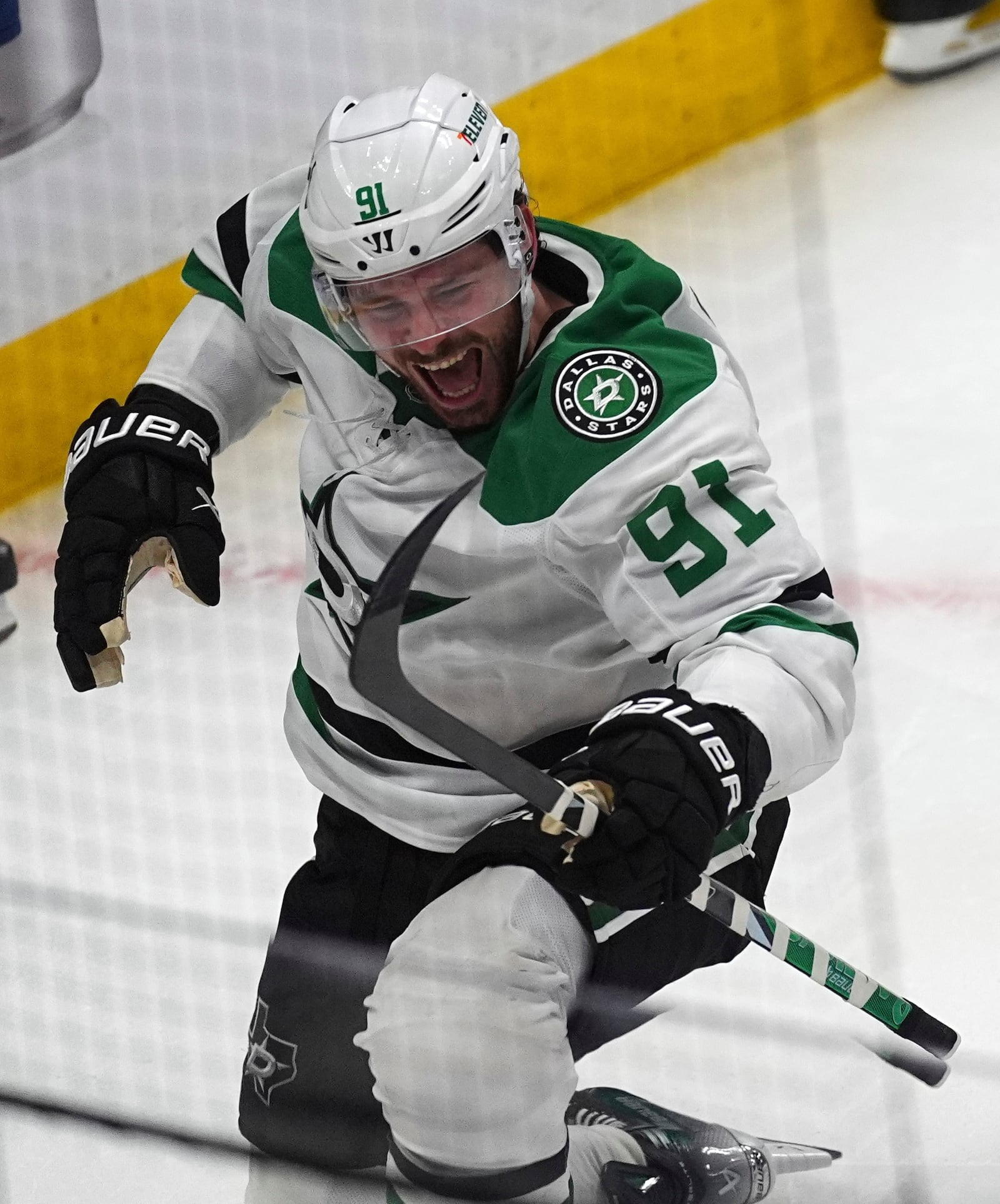 Dallas Stars center Tyler Seguin reacts after scoring the winning goal in overtime of Game 3 of an NHL hockey first-round playoff series against the Colorado Avalanche Wednesday, April 23, 2025, in Denver. (AP Photo/David Zalubowski)