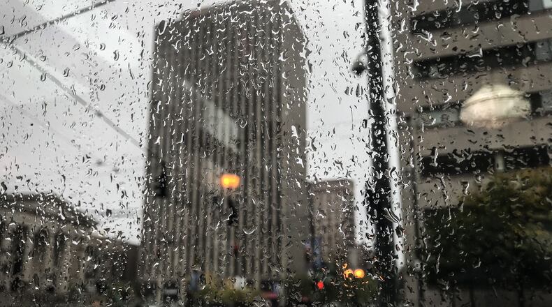 A cold front moved through the region on Monday, bringing rain and wind gusts to usher in fall weather. JIM NOELKER/STAFF