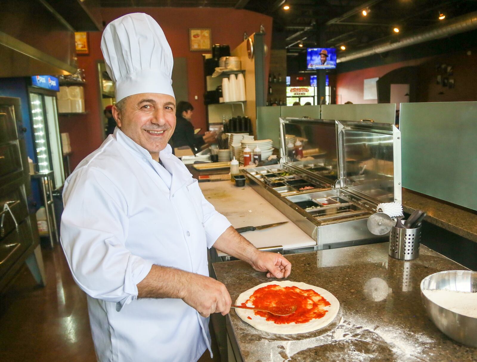 Owner and Chef Bruno Bas inside Fireside Café, which is now open at 6752 Cincinnati-Dayton Road in Liberty Twp. 