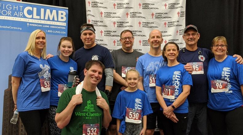 A team from the West Chester Twp. including Community Development Director Aaron Wiegand, (green shirt) a cancer survivor with a partial lung, climbed all 45 stories of the Carew Tower during the annual Fight for Air fundraiser.