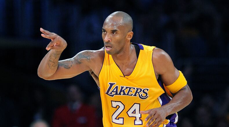 The Los Angeles Lakers' Kobe Bryant celebrates his 3-pointer against the Minnesota Timberwolves in the second quarter at Staples Center in Los Angeles on Wednesday, Oct. 28, 2015. (Wally Skalij/Los Angeles Times/TNS)
