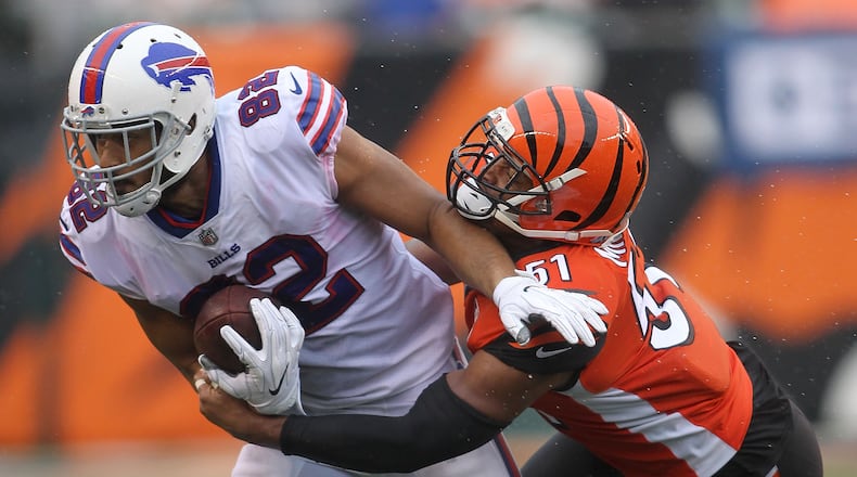 CINCINNATI, OH - OCTOBER 8: Kevin Minter #51 of the Cincinnati Bengals tackles Logan Thomas #82 of the Buffalo Bills during the second quarter at Paul Brown Stadium on October 8, 2017 in Cincinnati, Ohio. (Photo by John Grieshop/Getty Images)