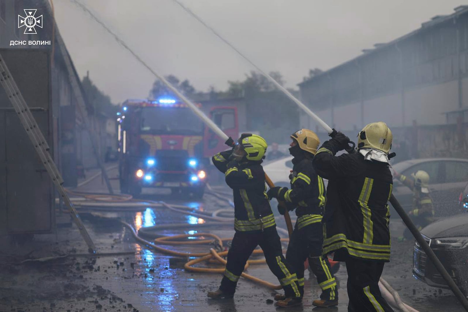 In this photo provided by the Ukrainian Emergency Service, firefighters put out the fire following a Russian attack in Volyn region, Ukraine, Wednesday, July 9, 2025. (Ukrainian Emergency Service via AP)