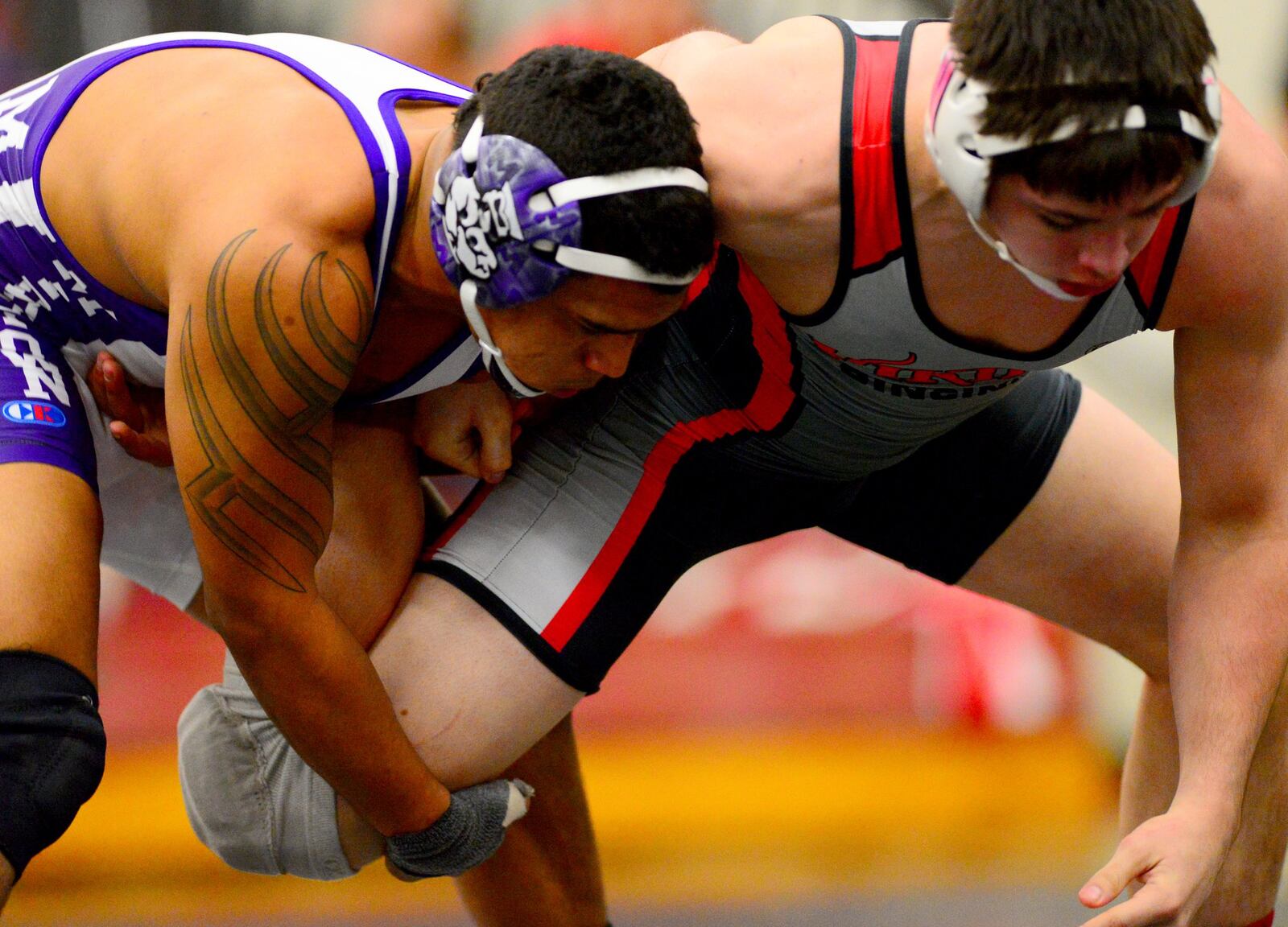 Latrell Davis (left) of Middletown, wrestles with A.J. Kowal of Princeton in the 152 lbs. weight class. Davis would beat Kowal 3-2 in the final round of the GMC Wrestling Tournamentat Lakota East High School in Liberty Twp. in Febrauary 2013.
