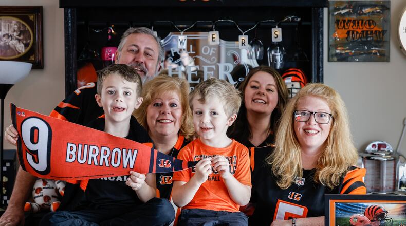 From left, Keegan McCarron, Darin Powers, Elizabeth Powers, Killian McCarron, Carly Maguire and Cassie McCarron, all super Bengal fans from New Lebanon. Elizabeth Powers has been a Bengals fan for more than 30 years. JIM NOELKER/STAFF