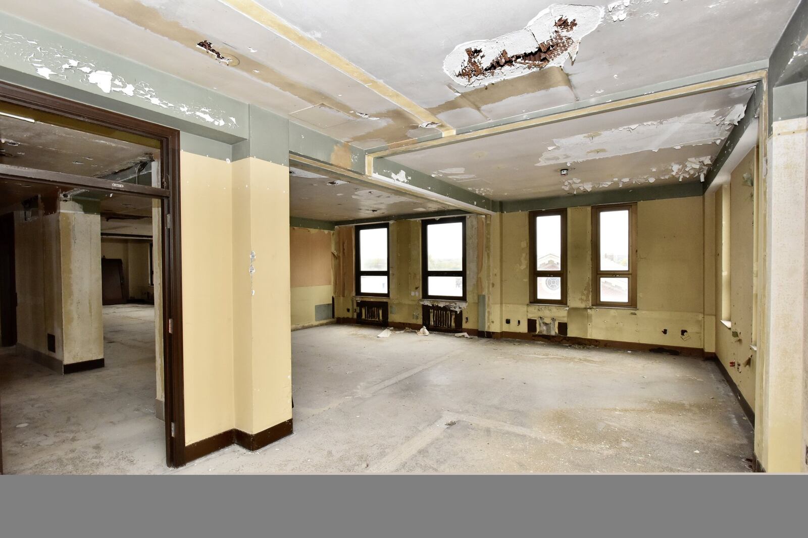 Developer Steve Coon walks through the Goetz Tower on the corner of Central Avenue and Main Street Friday, Oct. 26 in Middletown. After a water line break last winter, the Goetz Tower project is expected to get back on track to redevelop the office building into retail and apartment space. NICK GRAHAM/STAFF