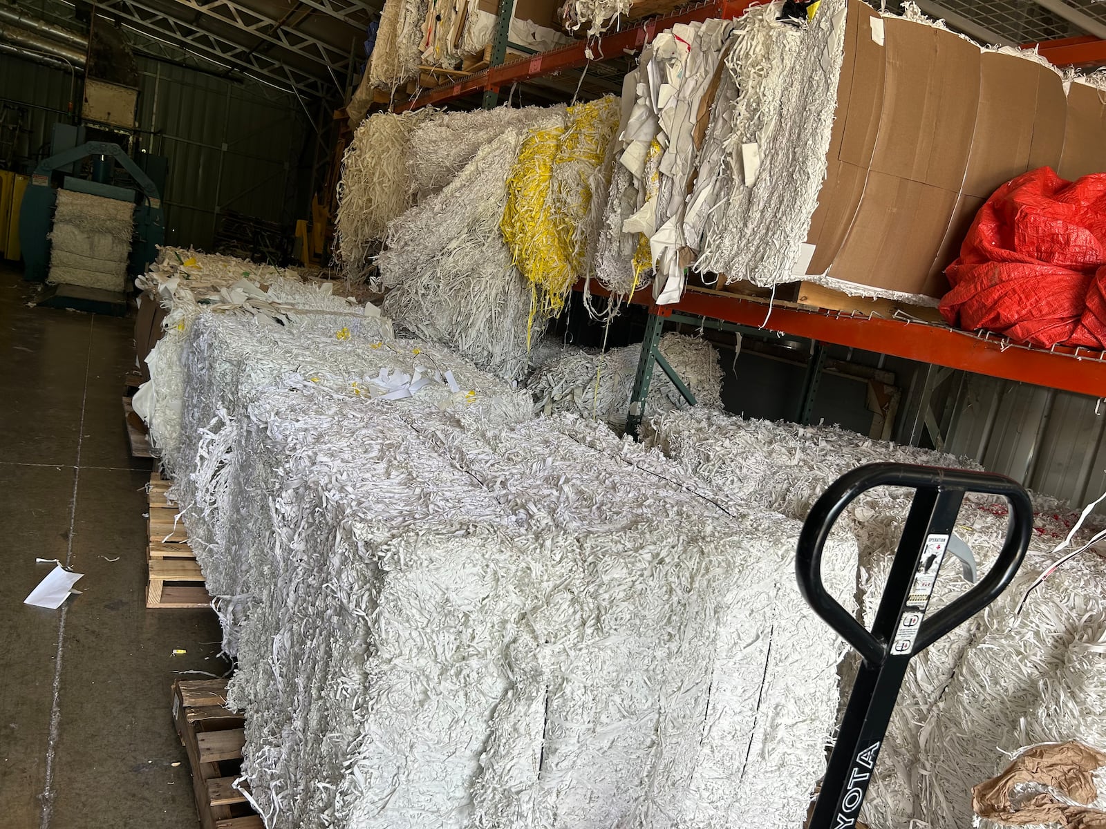 Bales of paper waste are ready to be shipped out of Crane Consumables in Monroe and recycled. RICK McCRABB/CONTRIBUTOR