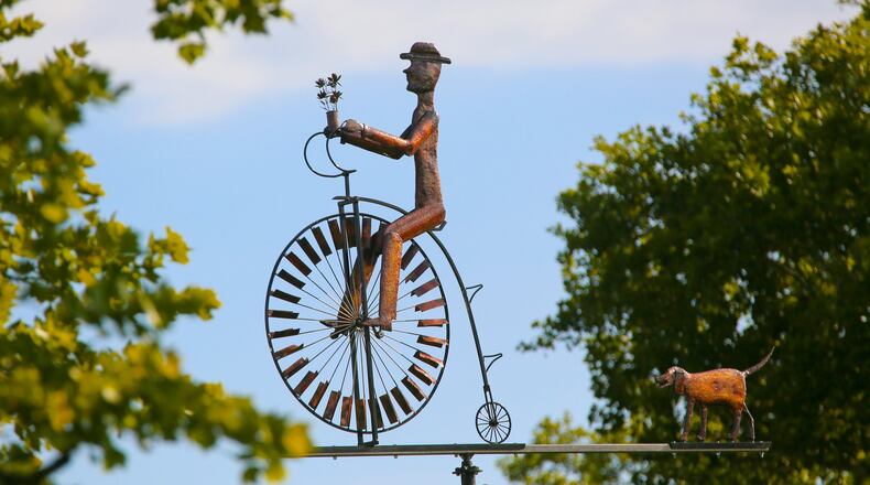 The Sherry Corbett Memorial Sculpture has been placed at the B Street park in honor of Dr. Sherry Lee Corbett by City of Sculpture Inc. and The Dayton Lane Historic Area Inc. for her commitment to restoration efforts in Hamilton. GREG LYNCH / STAFF
