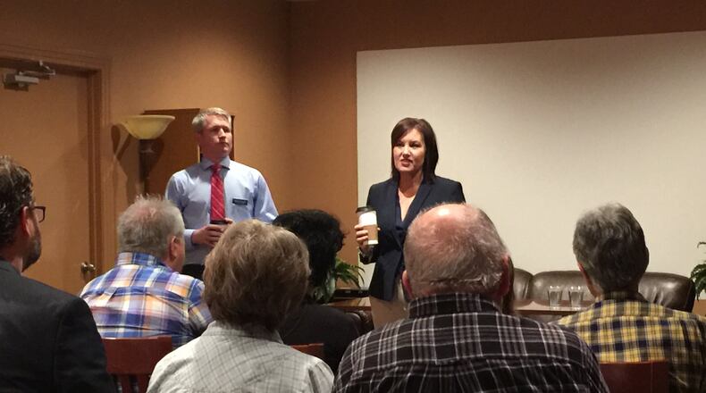 Ohio Lt. Gov. Mary Taylor met with supporters at Java Johnny’s in Middletown during a campaign stop Tuesday. Taylor is seeking the nomination for governor in the May 8 Republican Primary. At left is Taylor’s running mate, Hamilton businessman Nathan Estruth. ED RICHTER/STAFF