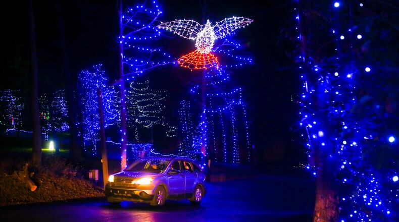 The Journey Borealis holiday light display was illuminated during a preview event Thursday, Nov. 19, 2020 at Pyramid Hill Sculpture Park in Hamilton. GREG LYNCH / STAFF