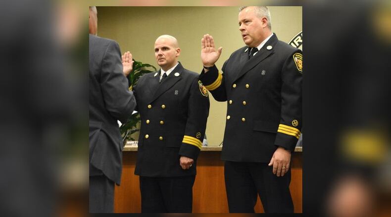 Pictured is an Oct. 11, 2017, file photo of Fairfield deputy fire chiefs Randy McCreadie, left, and Tom Wagner taking oaths of office when they were promoted to the positions. Both men will have stints serving as acting fire chief and are seeking the permanent position. MICHAEL D. PITMAN/FILE