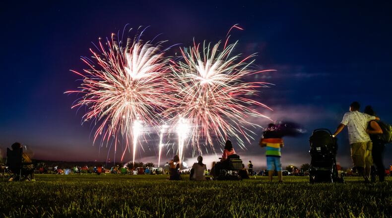 FILE: Balloon enthusiasts gather for The Ohio Challenge hot air balloon festival Friday, July 19, 2019 at Smith Park in Middletown. Fireworks ended the night after the balloon glow and pyrotechnics jump by Team Fastrax. NICK GRAHAM/STAFF