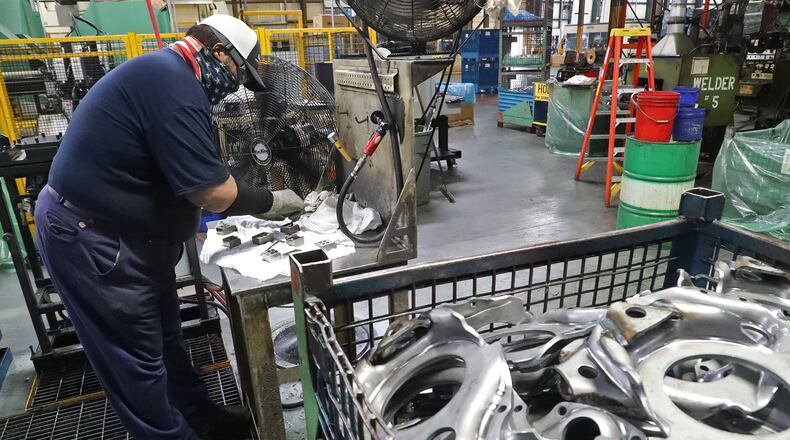 Some of the slower population growth in Ohio, experts said, may be the shift in the American economy from a manufacturing intensive economy to moving towards a finance, tourism, hospitality and technology intensive economy. Chris Martin changes the chuck in a precision drilling machine at Pentaflex in Springfield. BILL LACKEY/STAFF